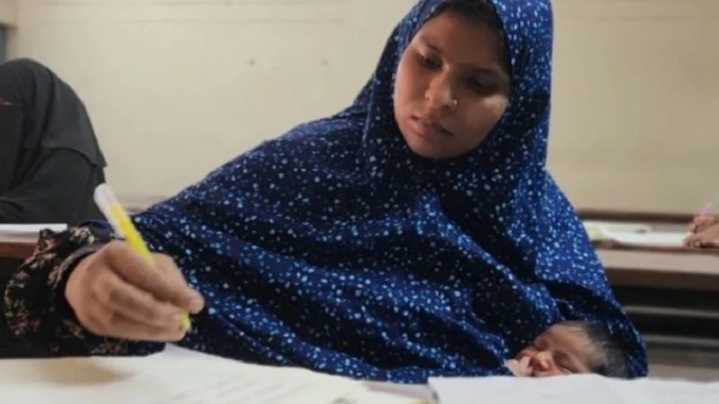 নবজাতককে কোলে নিয়েই পরীক্ষায় বসে মাতৃত্ব ও শিক্ষার এক অনন্য দৃষ্টান্ত স্থাপন করেছেন দুই নারী